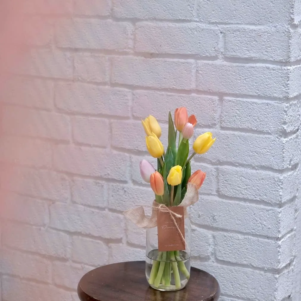 Colourful Tulips in jar