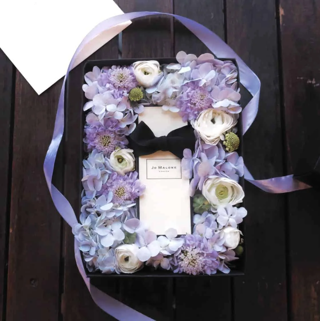 Hydrangea, Scabiosa and Ranunculuses. Paired with Jo Malone 30ml cologne.